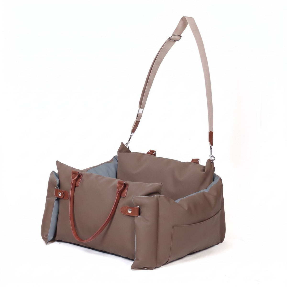 Light brown faux leather portable dog car seat bed with leather handles and shoulder strap
