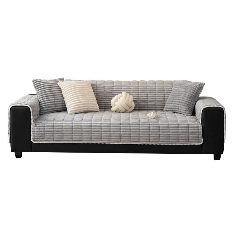 One-piece flannel couch cover on a full sofa