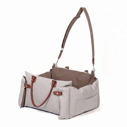 Cream white faux leather portable dog car seat bed with leather handles and shoulder strap