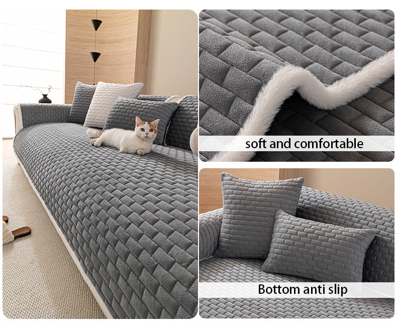 Grey quilted sofa cover with non-slip backing