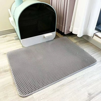Gray double-layer litter mat in front of a litter box