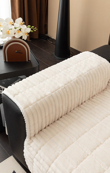 Cream flannel cover on the sofa arm