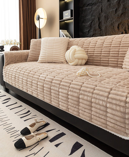 Coffee flannel couch cover on sofa