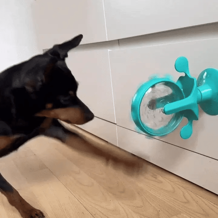 Interactive Spinning Treat Dispenser Toy with Suction Base — Slow-Feeder for Dogs & Cats