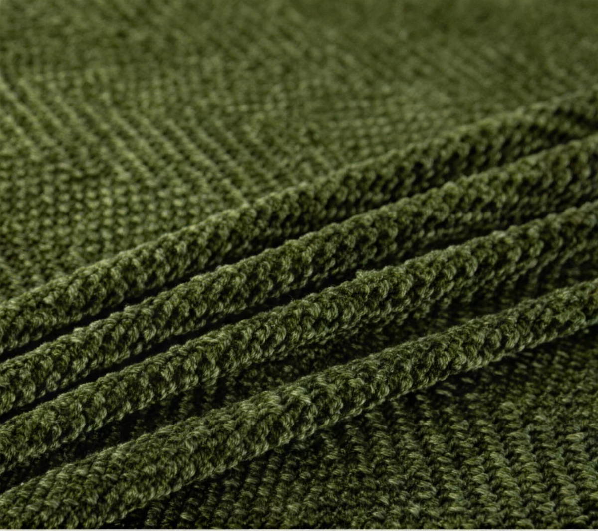 Green herringbone texture close-up