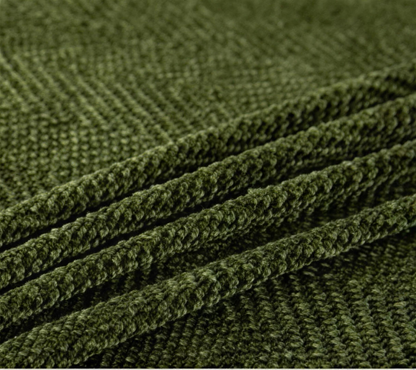 Green herringbone texture close-up