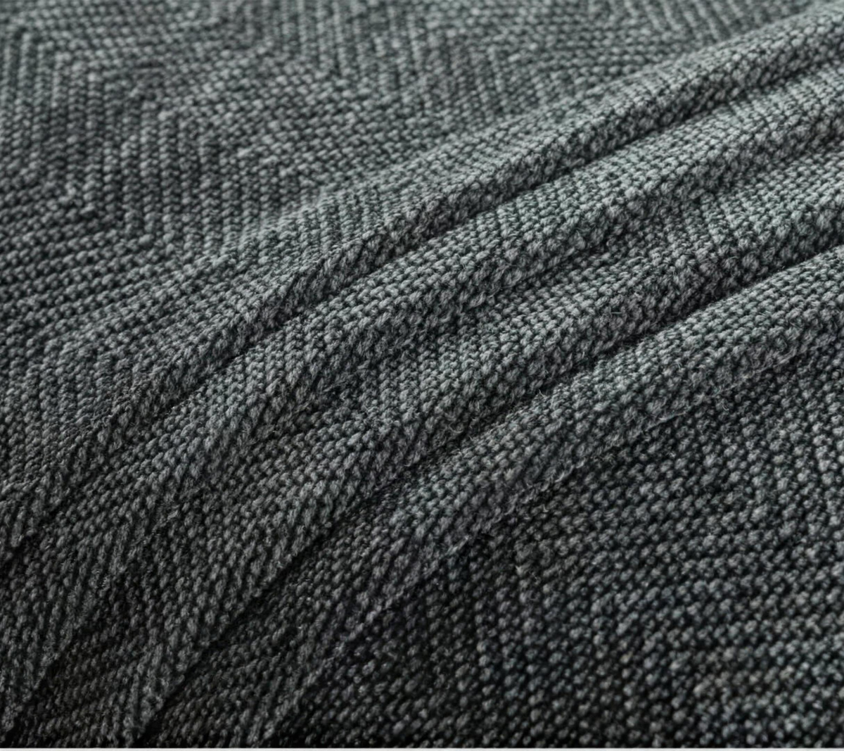 Grey herringbone texture close-up